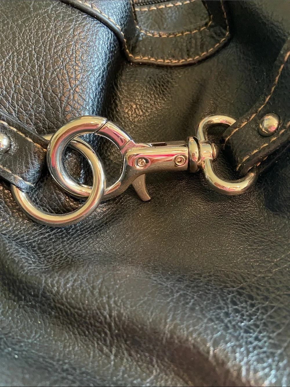 Black Women's Vinyl Handbag with Silver Hardware. Three sections for organizing